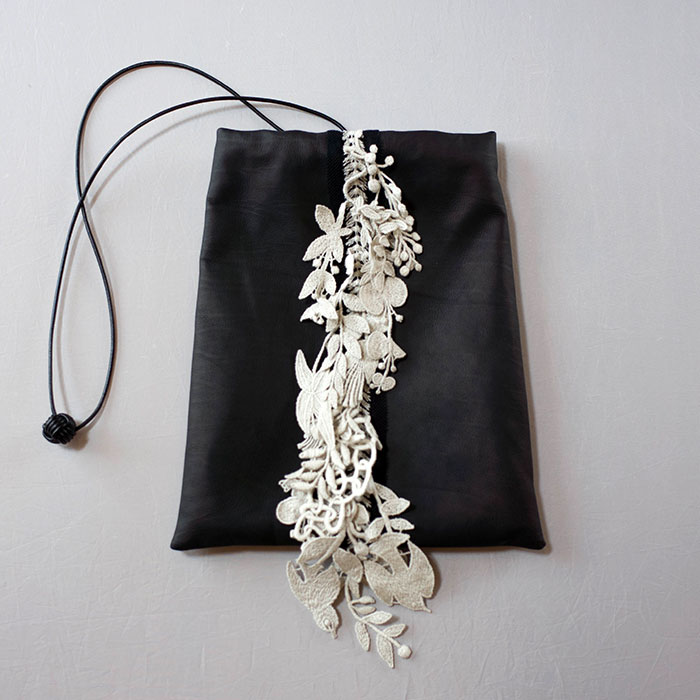 ミナペルホネンforest parade レザー巾着バッグ#black | Lin total