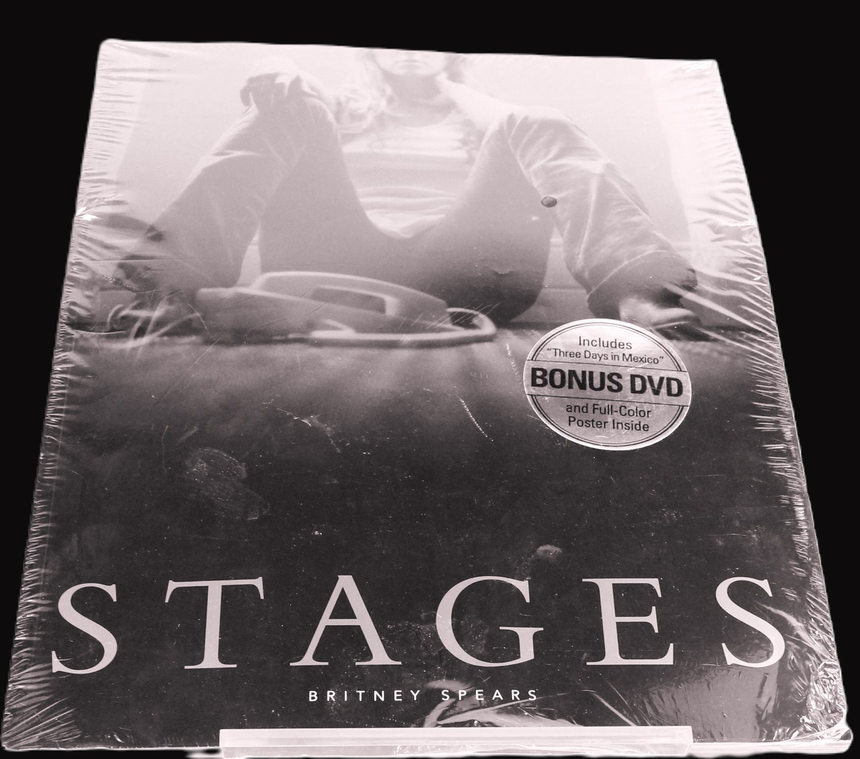 Britney Spears Stages Book Concert Photo Album, Color Poster, and