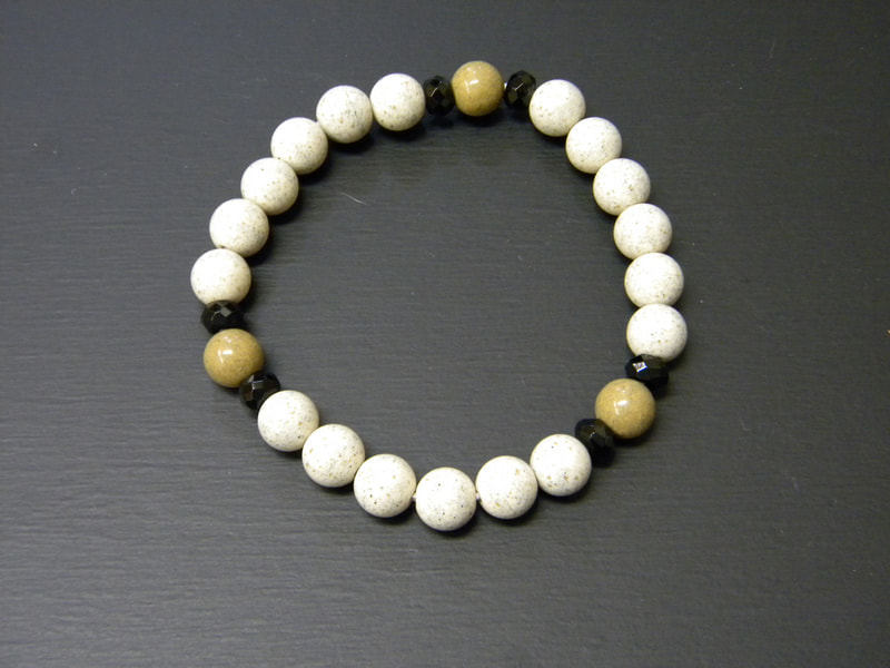 35番 8mm玉ブレスレット（玉川産北投石、台湾産北投石、オニキス） 北