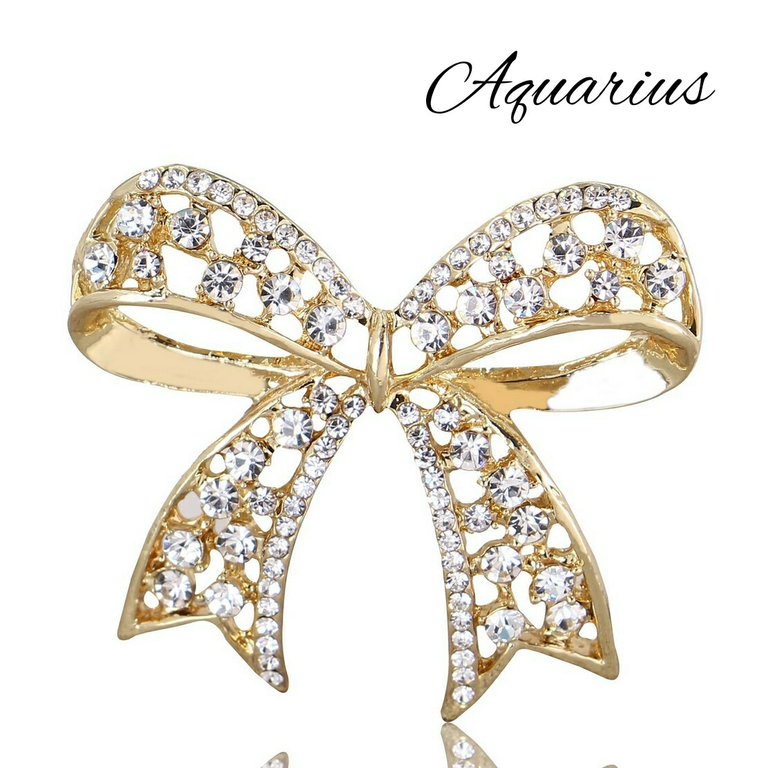 楽天市場】スワロフスキー ゴールド リボン ブローチ : Aquarius