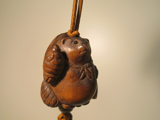 楽天市場】木彫り 根付 ストラップ〜たぬき〜一刀彫／材料：柘植