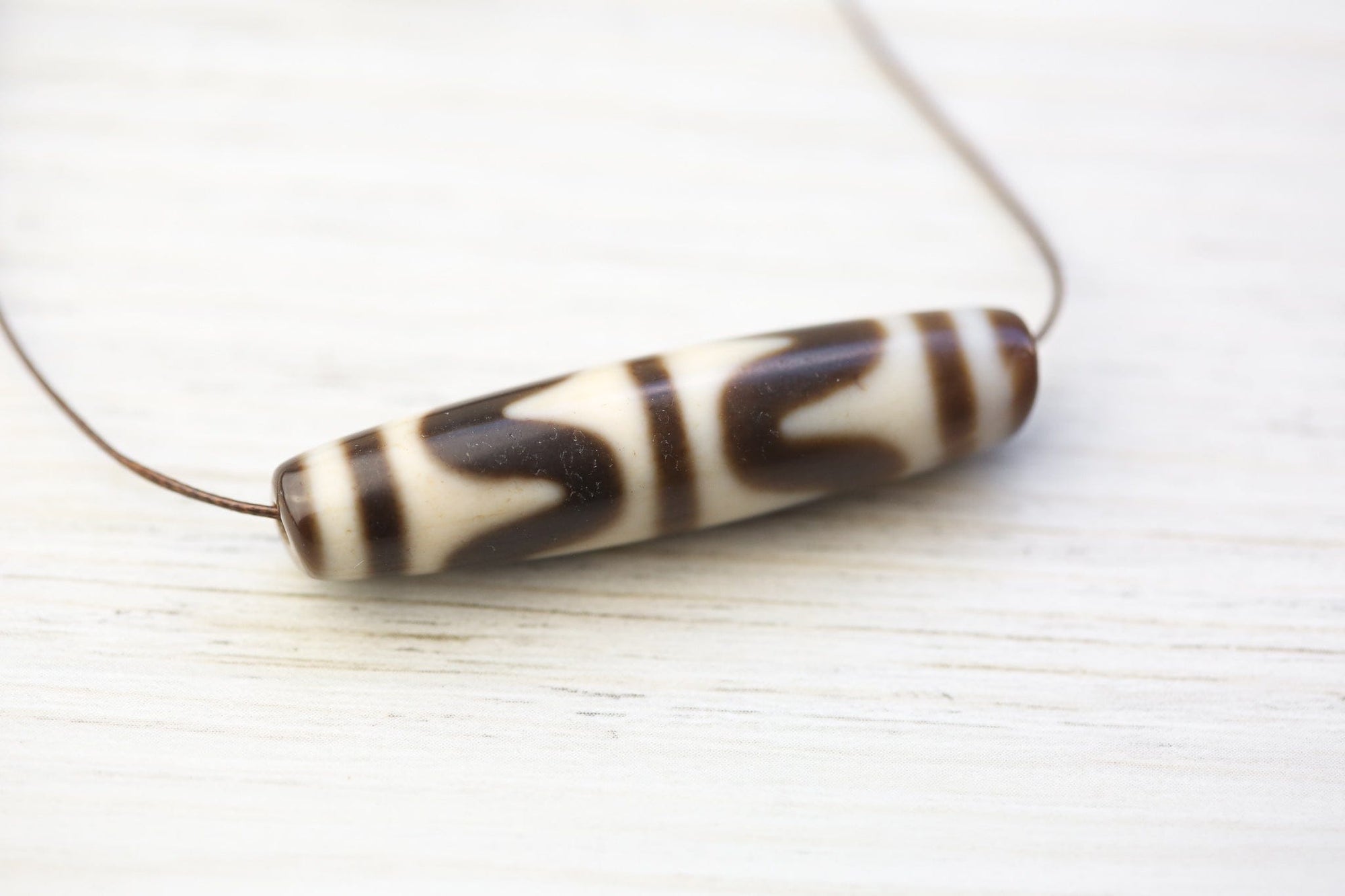 Tiger Tooth Dzi Bead for Protection - DharmaShop