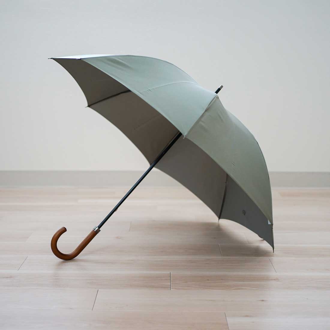 A stylish men's long umbrella with a two-color combination that is