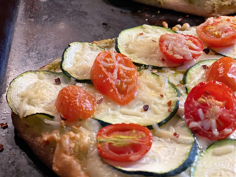 Naan Pizza with Pesto, Zucchini, & Tomatoes