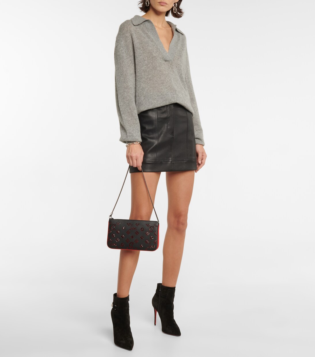 Loubila perforated leather clutch in black - Christian Louboutin