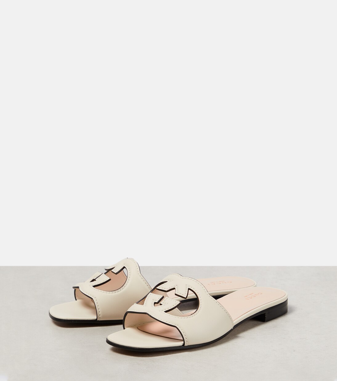Interlocking G cutout leather sandals in white - Gucci | Mytheresa
