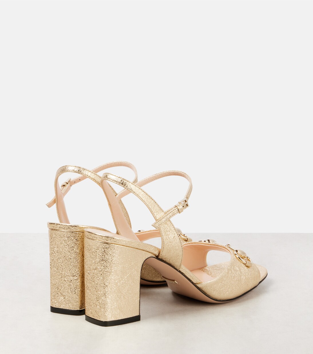 Horsebit metallic leather sandals in gold - Gucci | Mytheresa