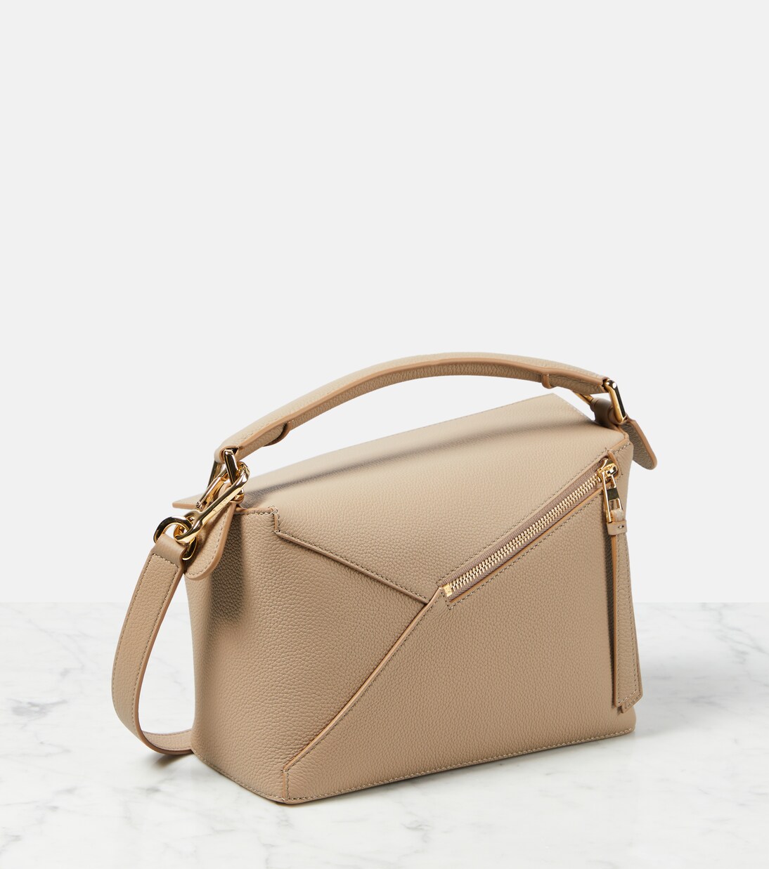 Puzzle Edge Small leather tote bag in beige - Loewe | Mytheresa