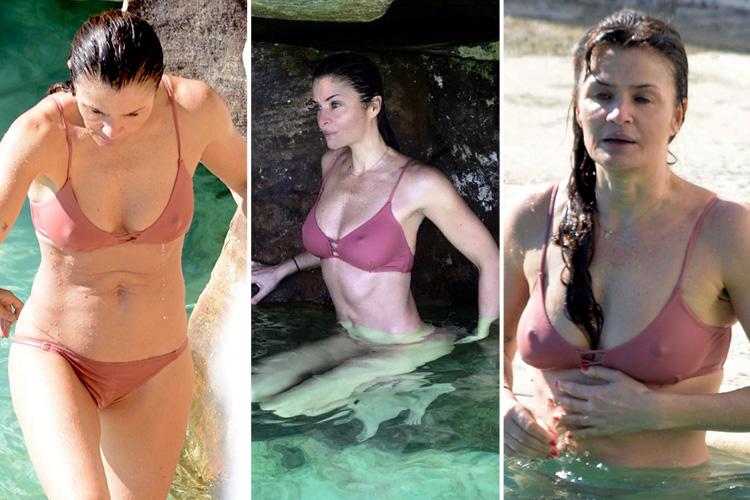 Helena Christensen, 49, shows off her enviable figure in skimpy