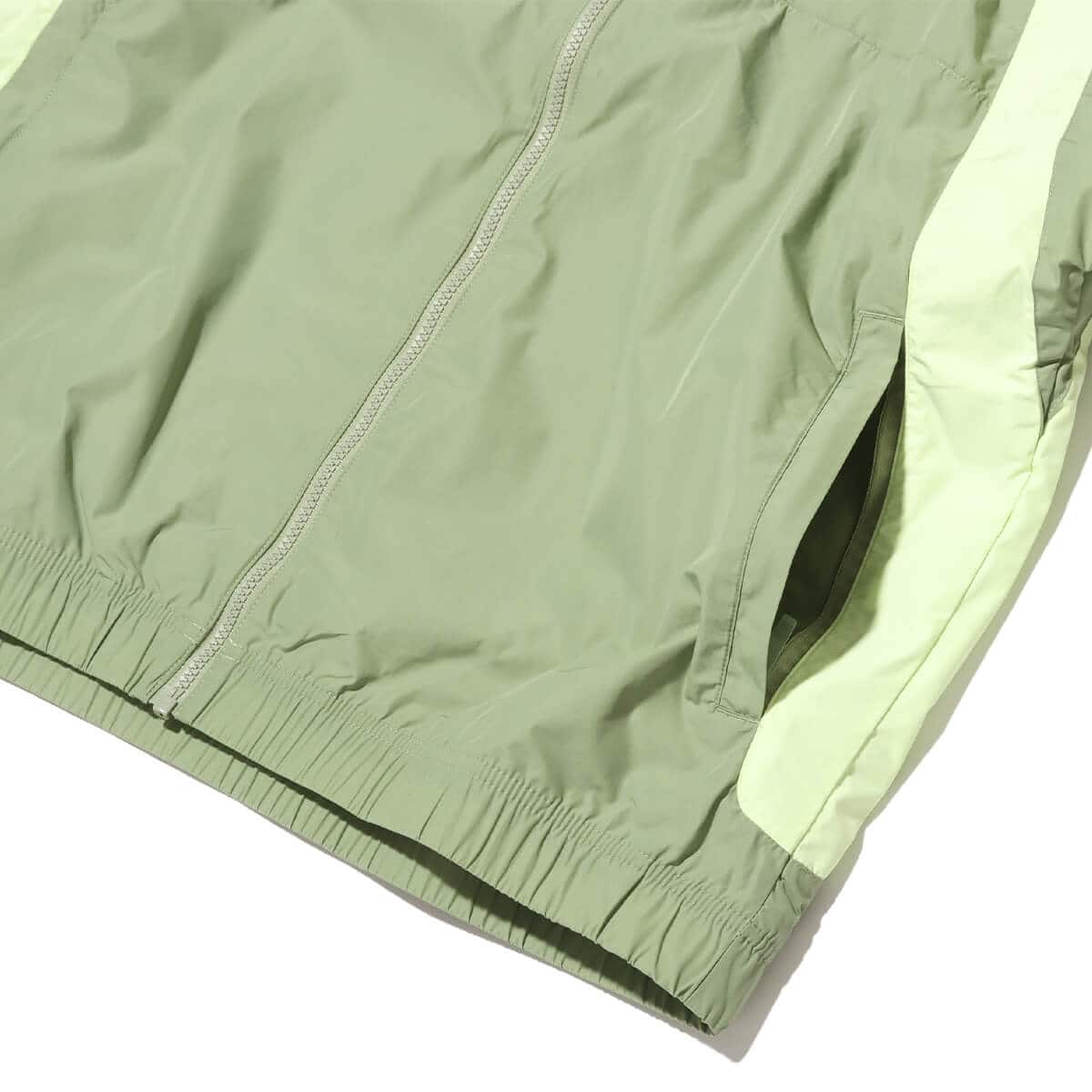 NIKE M NRG NOCTA CS TRK JKT WVN OIL GREEN/LT LIQUID LIME/LT LIQUID