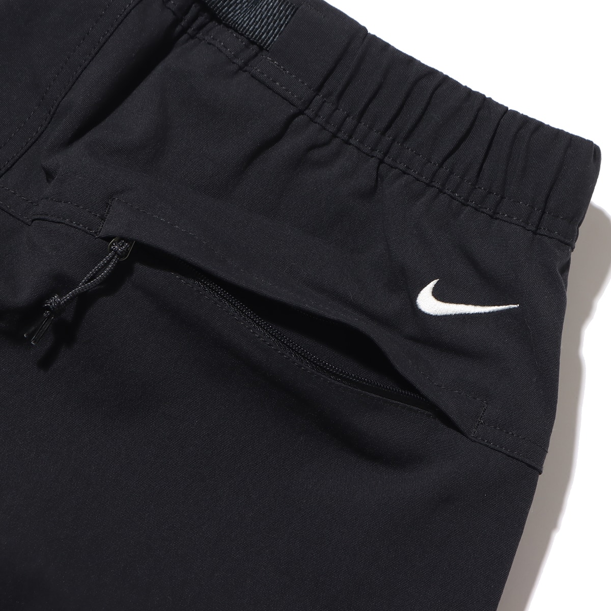 NIKE AS M ACG SMITH SUMMIT CRG PANT BLACK/ANTHRACITE/SUMMIT WHITE