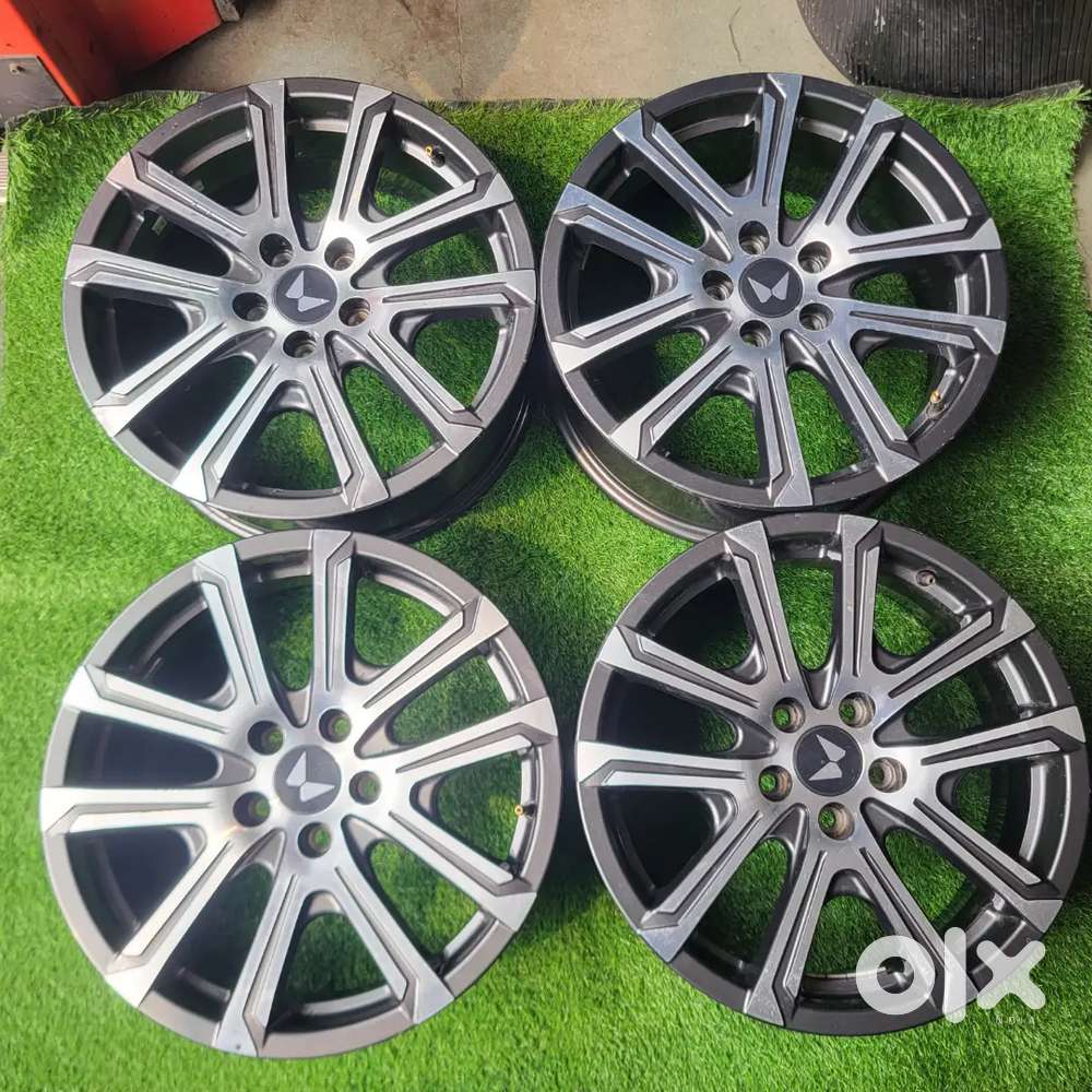 I want to sell NEW MAHINDRA XUV 700 18 INCH ALLOY WHEELS. - Spare
