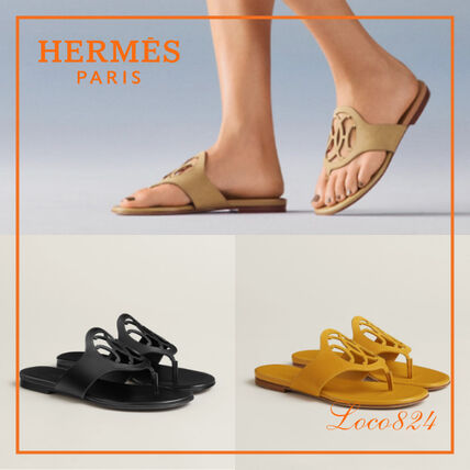 イエロー（黄色）系 HERMES(エルメス) サンダル・ミュール(レディース