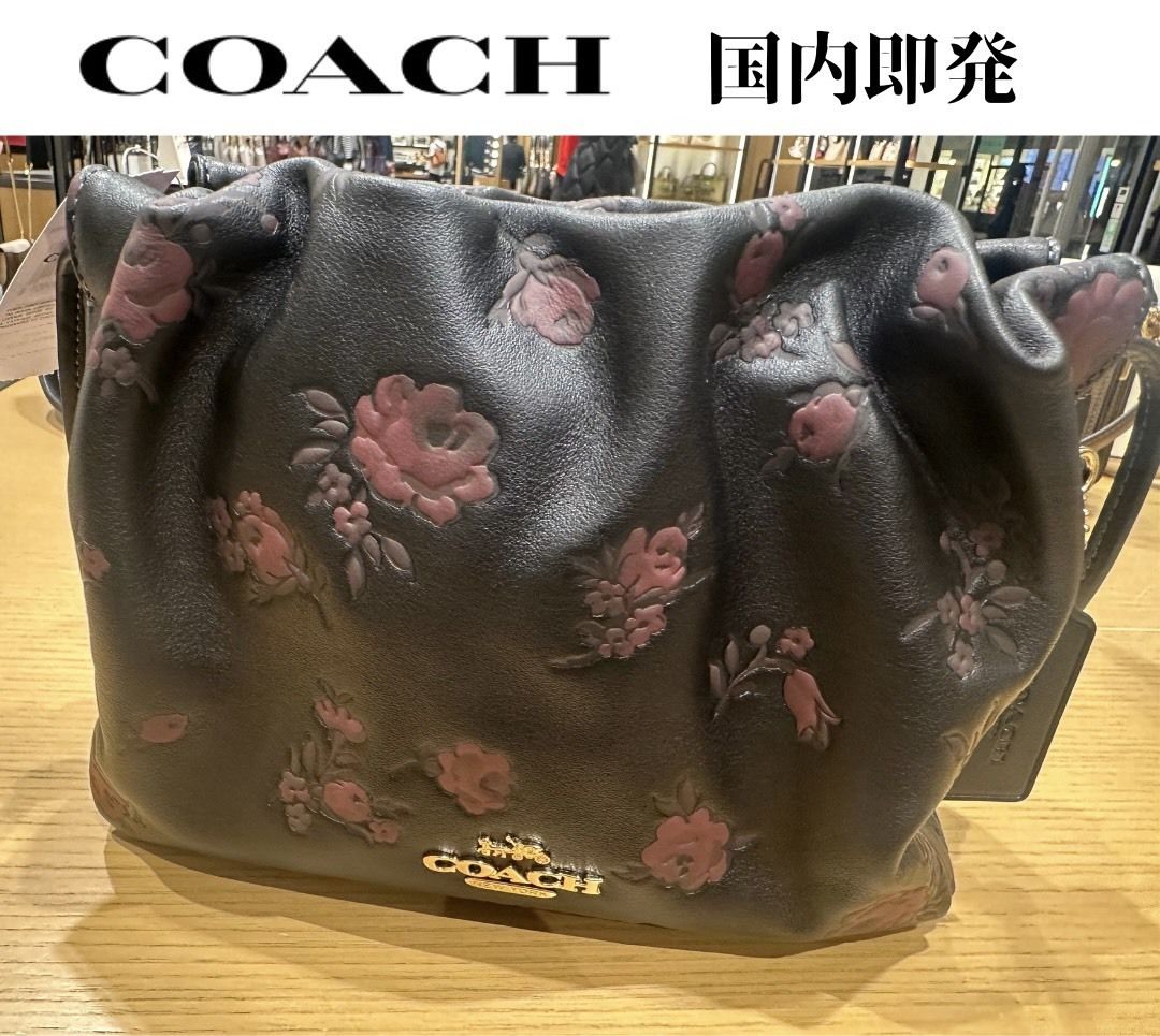 COACH フェイ ドローストリング バッグ フローラル ☆国内即発 (Coach