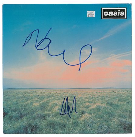 Oasis: Noel and Liam Gallagher Signed Album | RR Auction