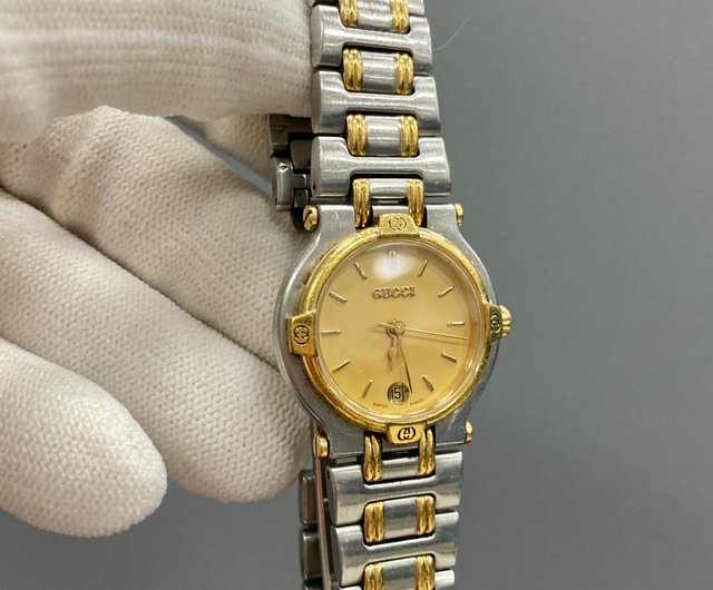 台湾 グッチラウンドゴールドダイヤル日付グリッド立体ロゴ