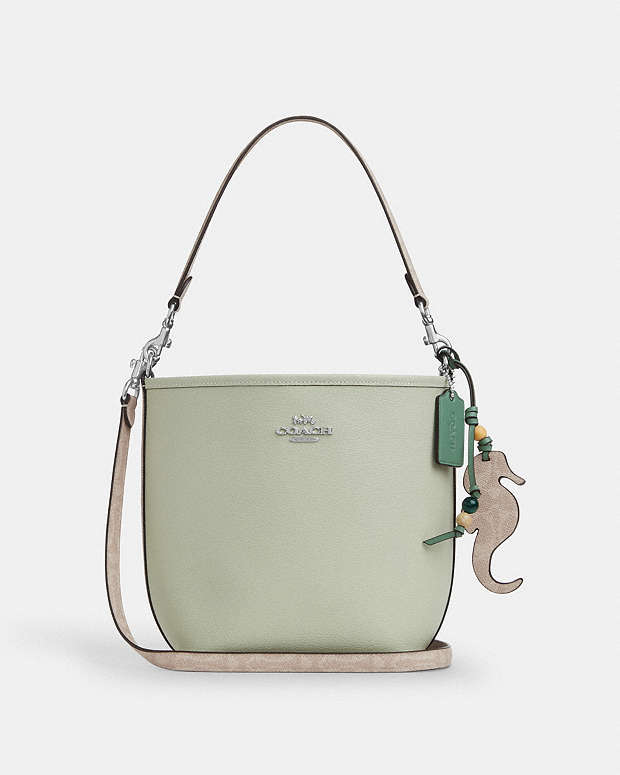 公式】コーチアウトレット | シティ バケット バッグ・シーホース チャーム