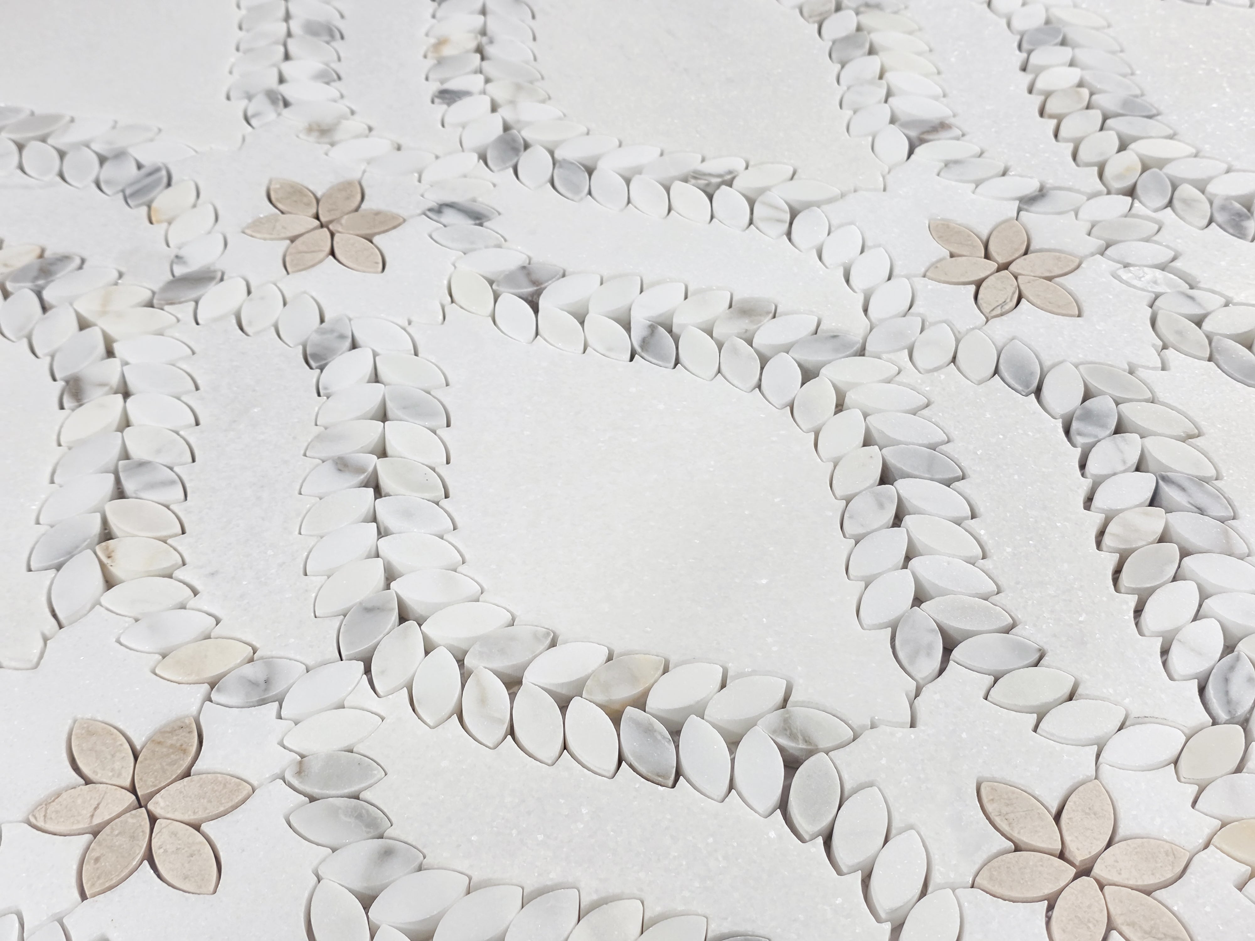 White Thassos Lillia with Calacatta Gold & Crema Marfil Waterjet