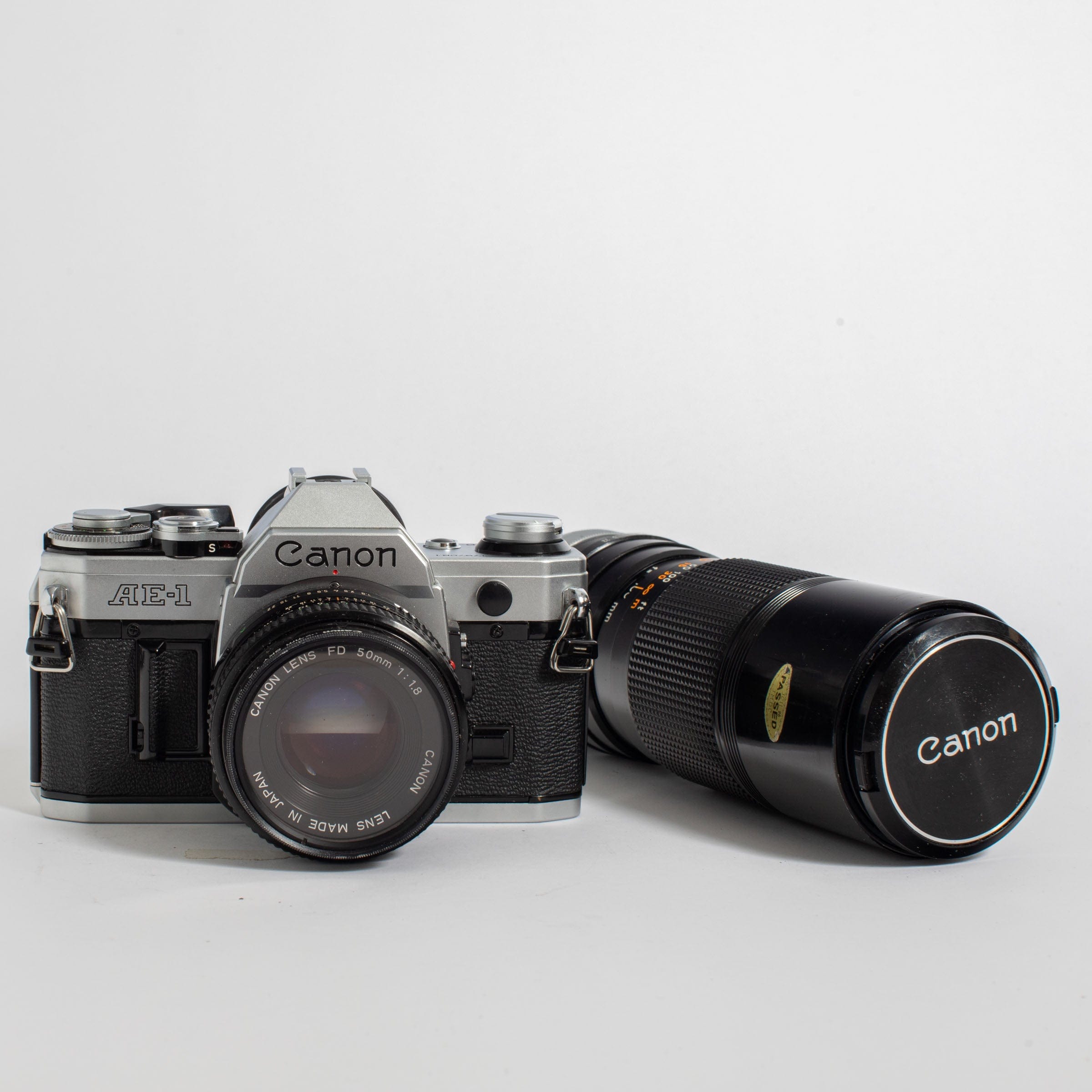 Canon AE-1 with 50mm FD f/1.8 Lens and Canon FD 100-200mm f/5.6
