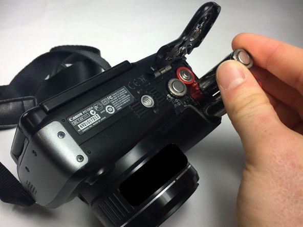 Canon Powershot SX10 IS Battery Door Replacement - iFixit Repair Guide
