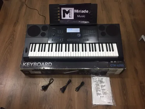 Teclado Casio Ctk 6200 + Porta Partituras E Acessórios 127/220v