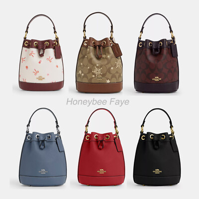 NWT Coach Dempsey Drawstring Bucket Bag 15 With Bow/Star And