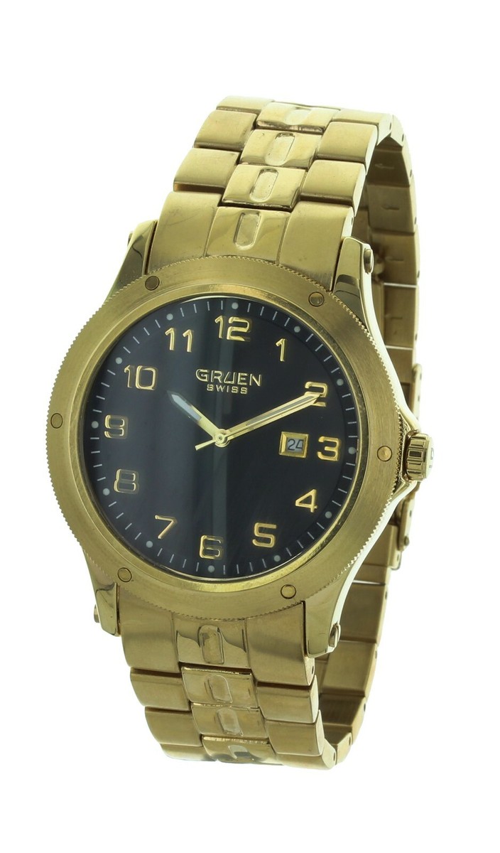 Men's casual GRUEN SWISS watch gold tone band and case, black dial