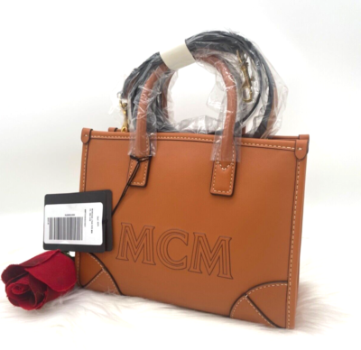 MCM Munchen Mini Logo Prints Leather Tote Crossbody Bag In Cognac