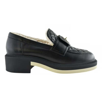 Chanel 21B Black Quilted Turnlock CC Logo Gold Shearling Fur Mule