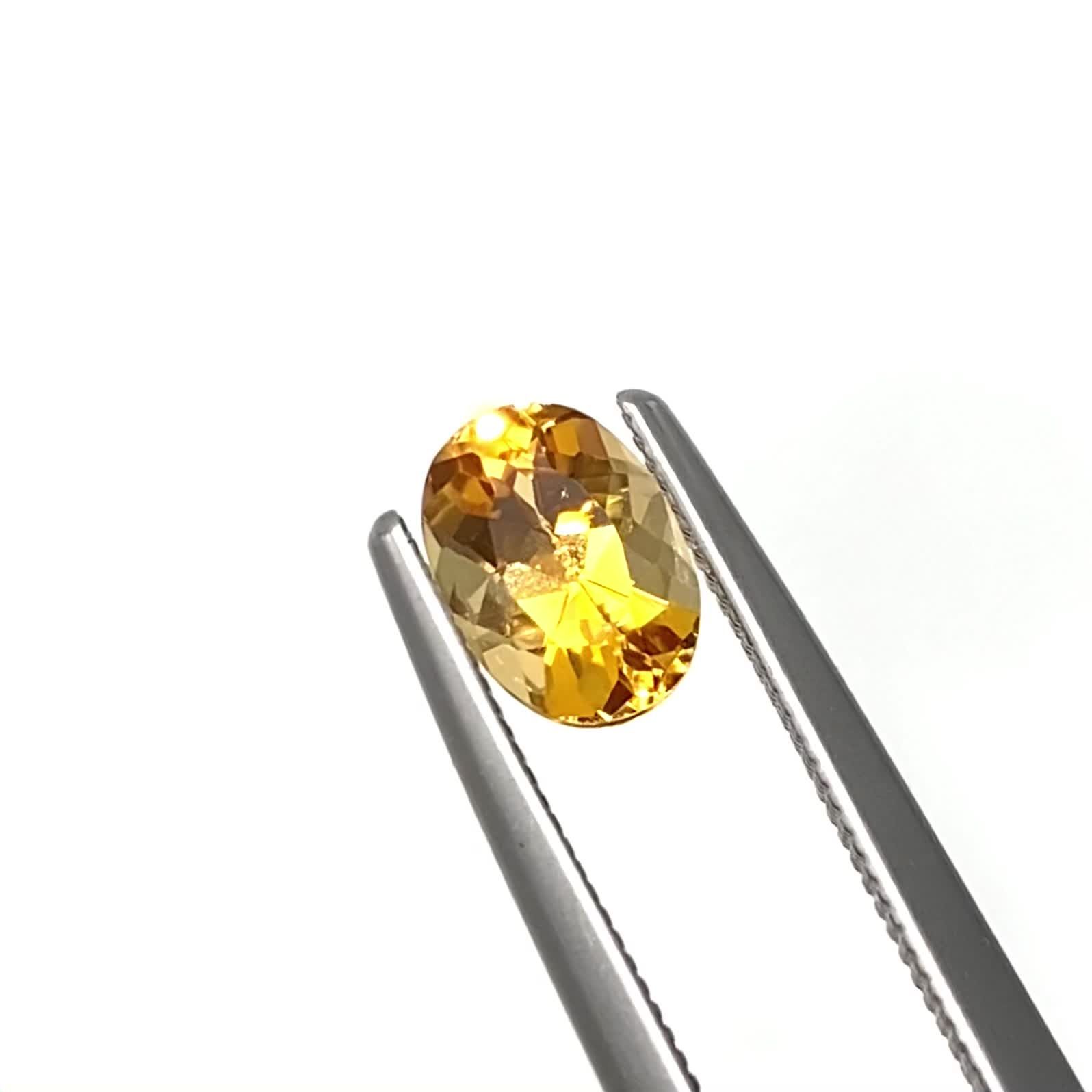 インペリアルトパーズ(宝石名トパーズ)ブラジル産 識別済 0.73ct / 6.5