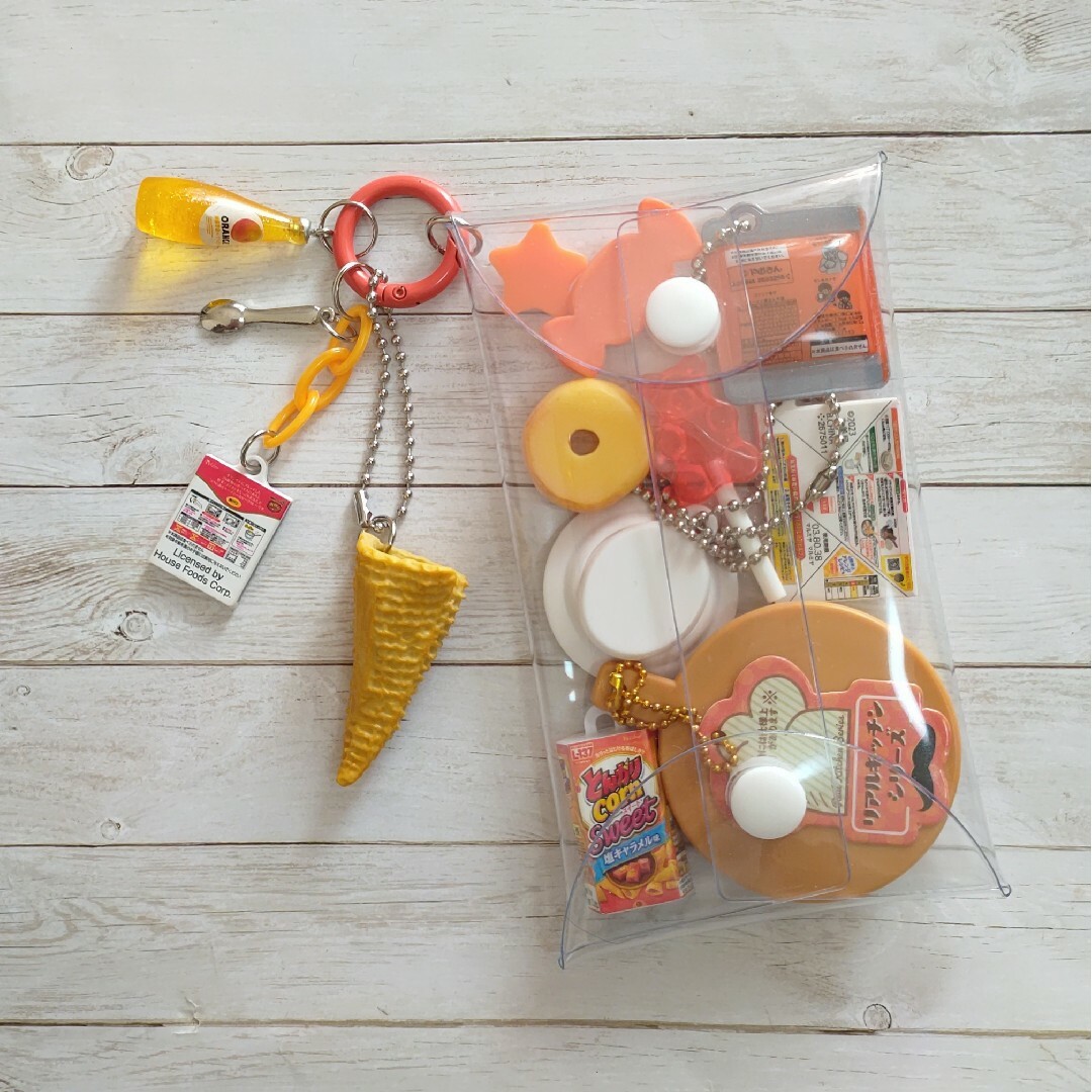 ガチャ詰めポーチ オレンジ系 橙色の通販 by 3sary's shop｜ラクマ