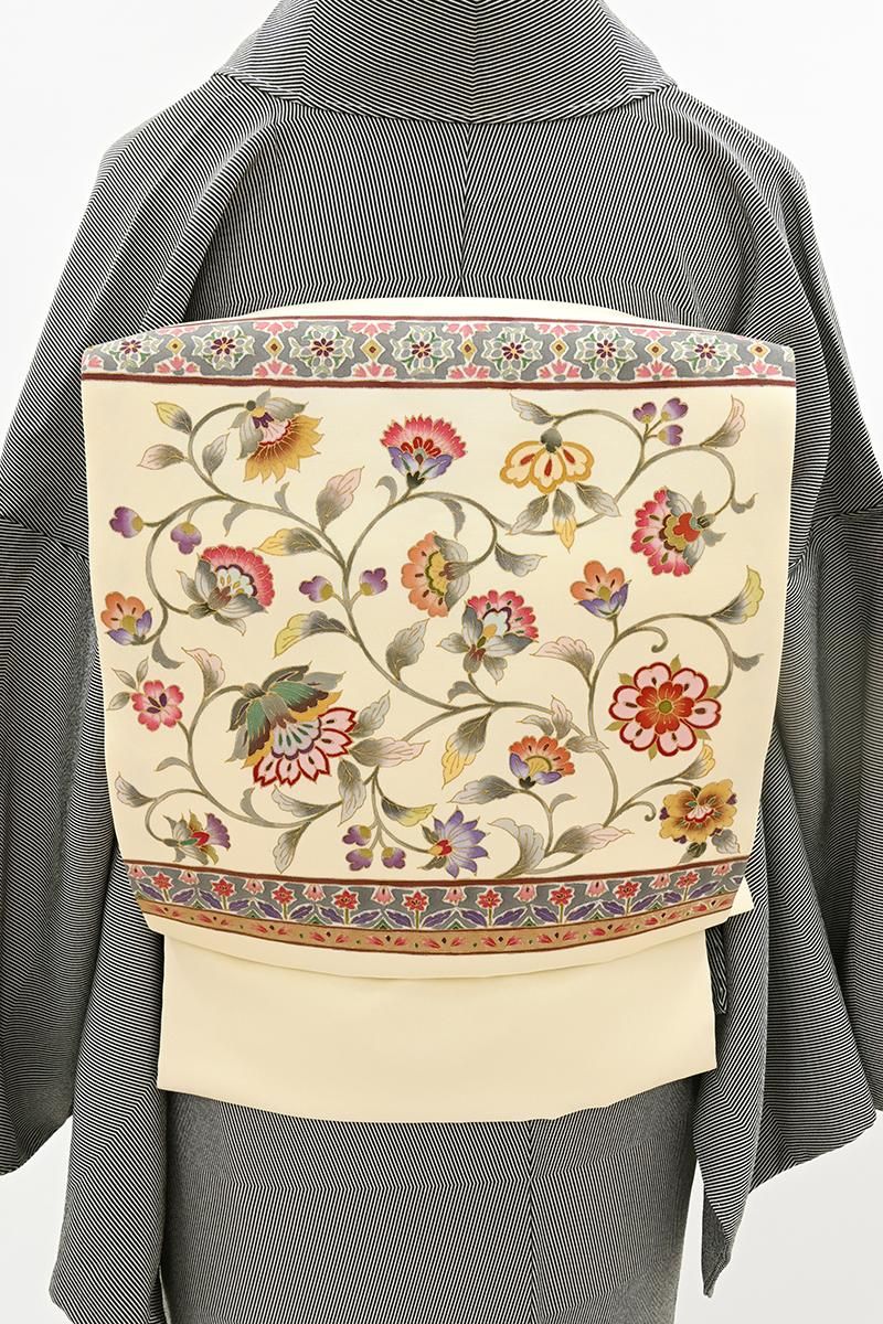 銀座【H-0837】塩瀬地 染名古屋帯 鳥の子色 更紗花文 - 銀座きもの青木