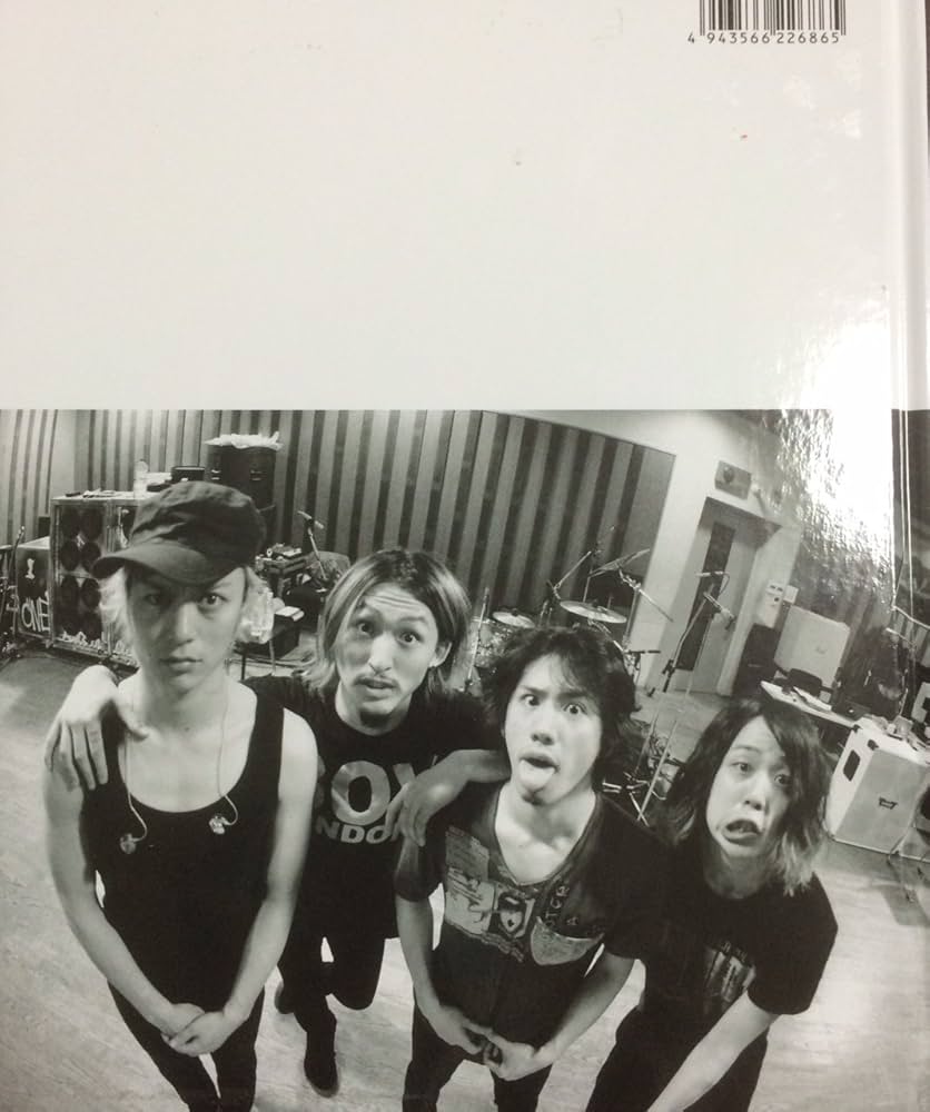 Amazon.co.jp: One Ok Rock Primal Footmark #3 (2014) 写真集 : ONE