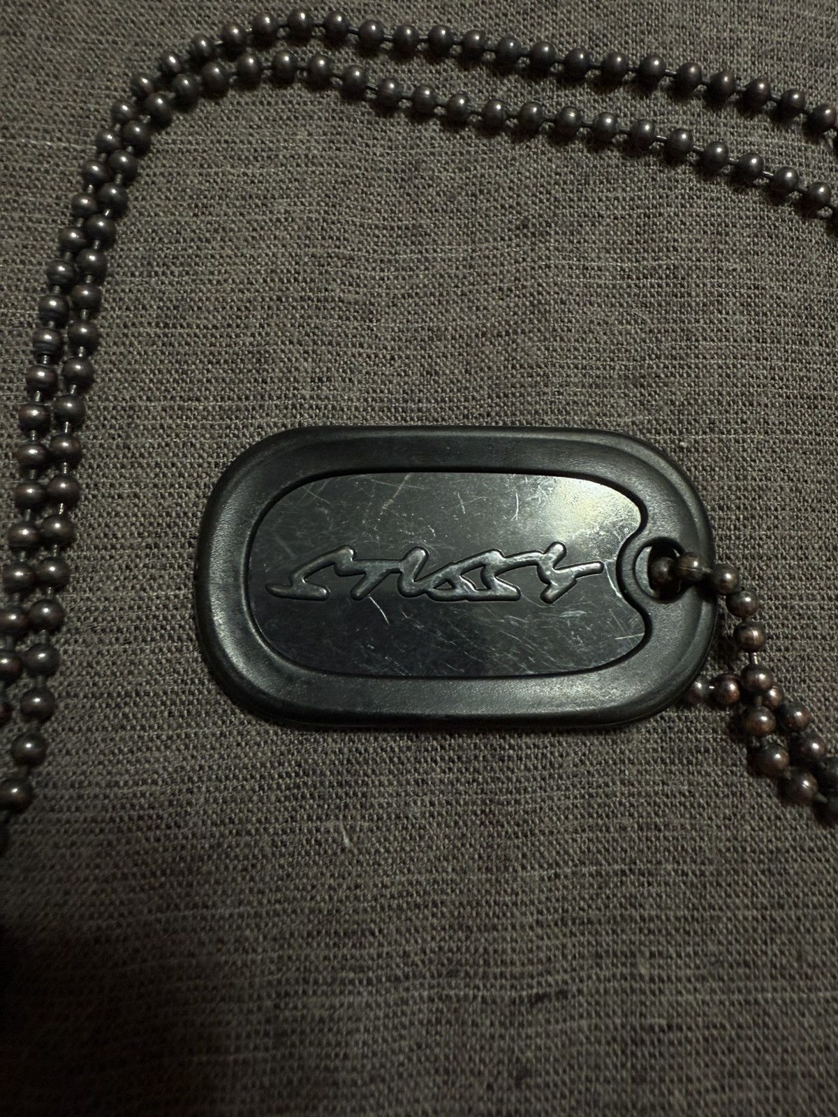 Stussy Dog Tag Bottle Opener Necklace | Grailed
