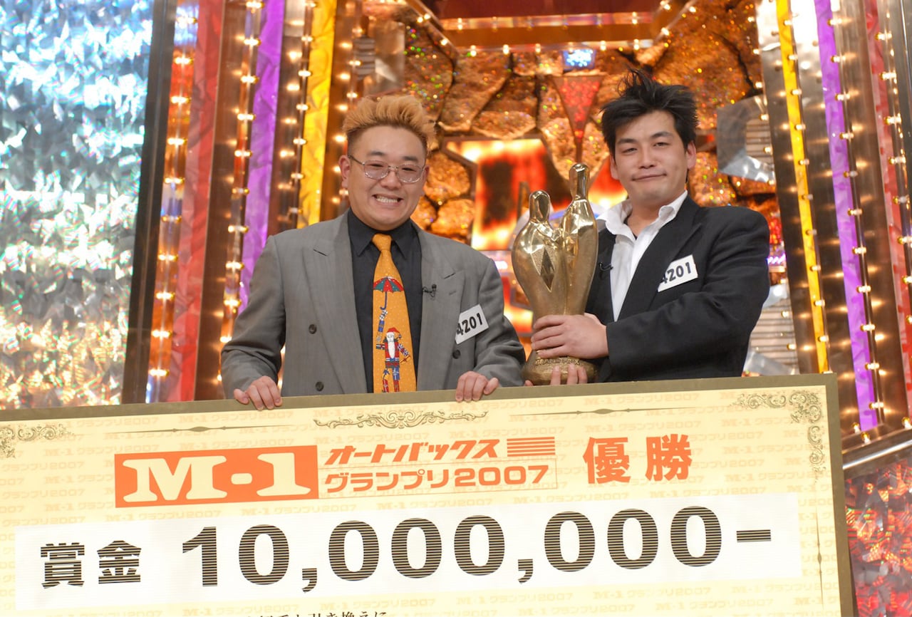 M-1グランプリ」2007年チャンピオンのサンドウィッチマン。(c)ABC