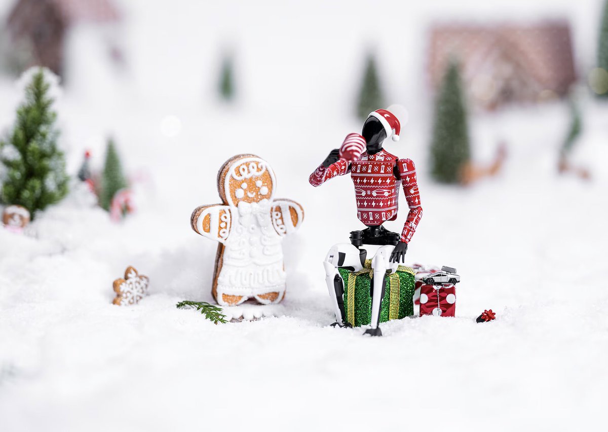 Tesla has released a Holiday Edition Tesla Bot action figure in