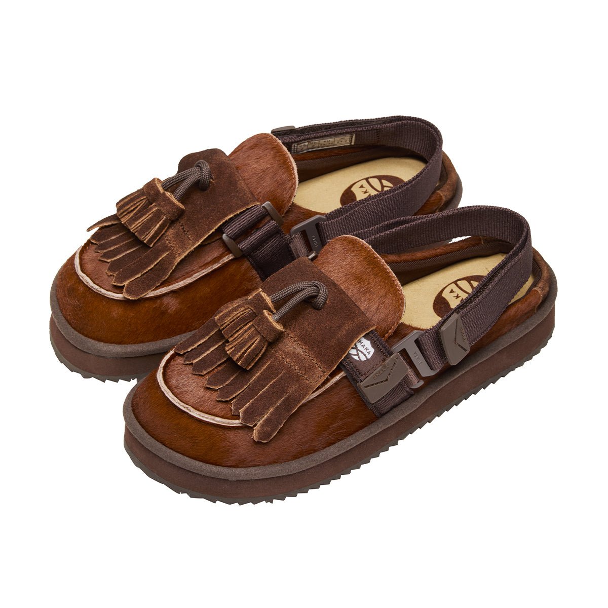 SHAKA キルトタッセル付きミュールサンダルMOC MULE TASSEL COWHAIR