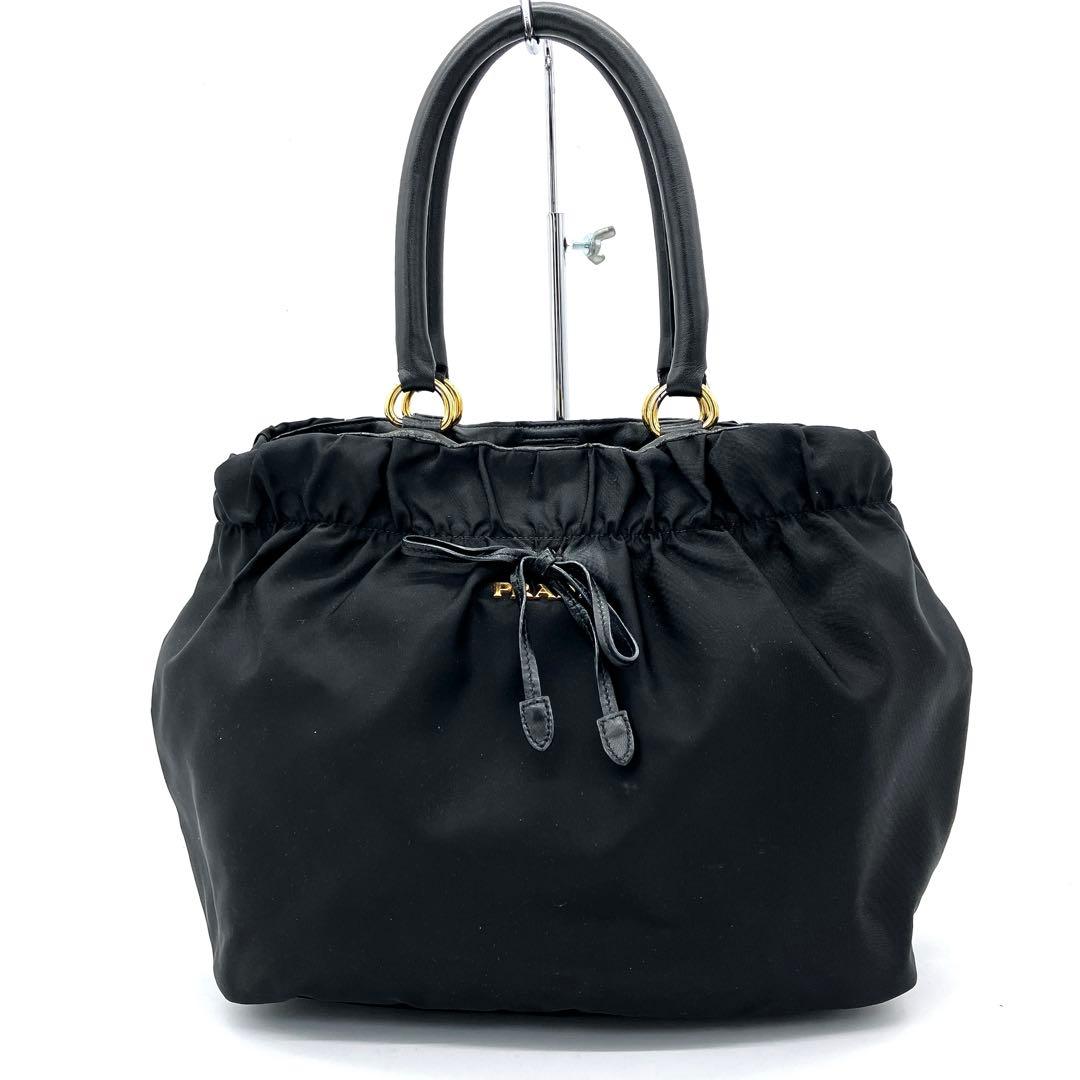 【PRADA】ハンドバッグ　リボン　ロゴ金具　ゴールド金具　ナイロン　ブラック PRADA（プラダ） 極 美品 ロゴ 金具 リボン モチーフ ナイロン レザー