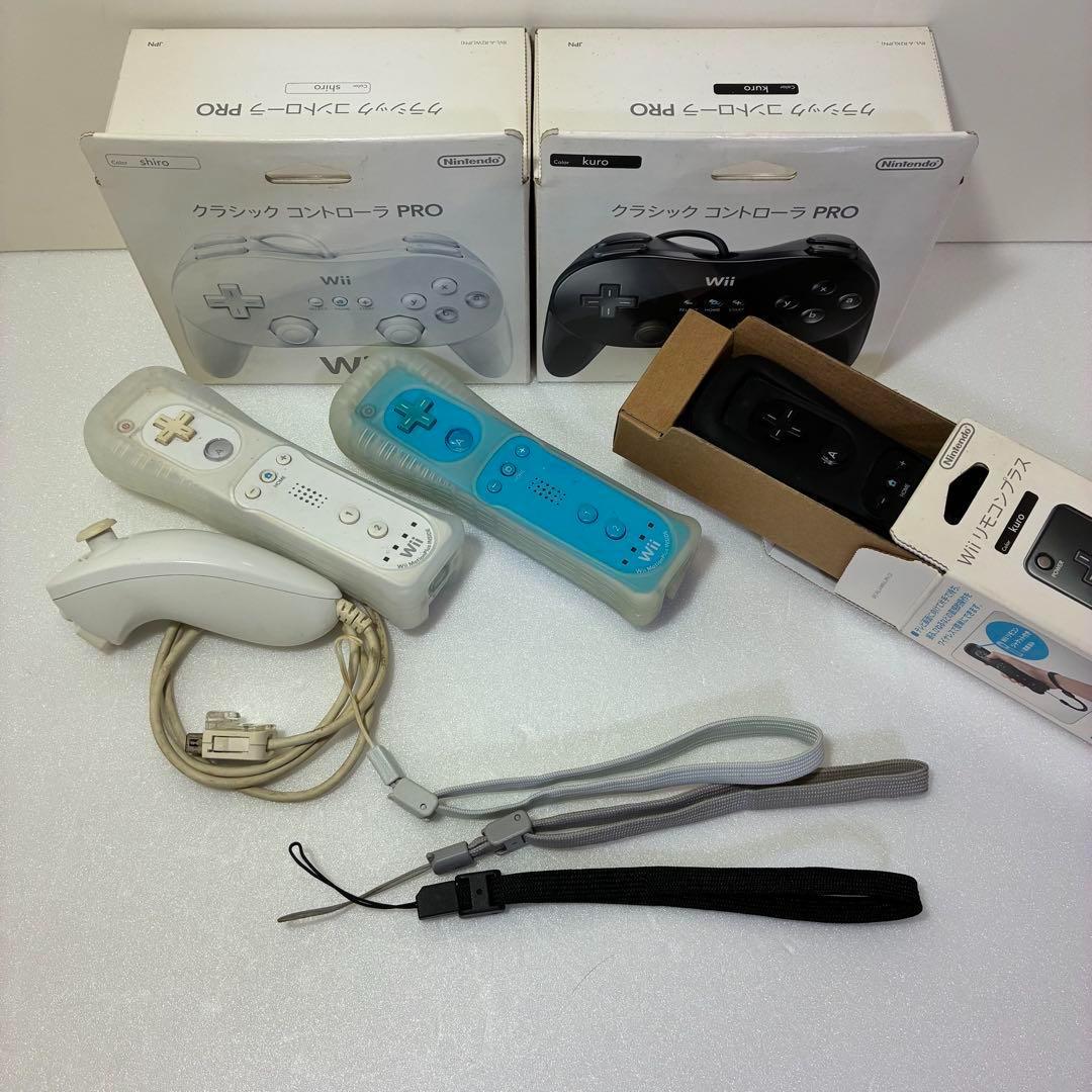 Wii本体 ＋ リモコン、コントローラー各2台 ＋ 充電器 ＋ ソフト9本