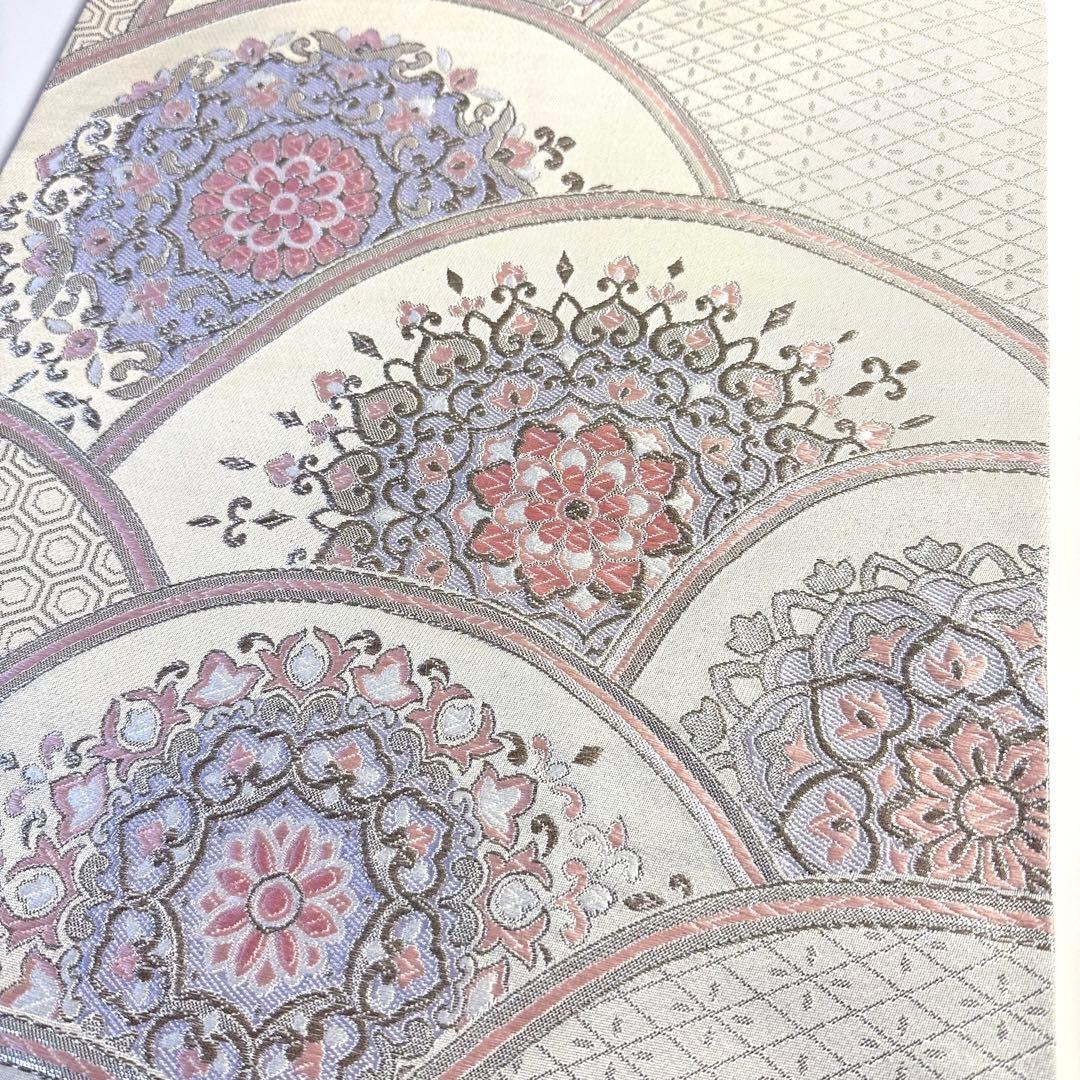 6k277 袋帯 絹 唐織 正倉院文様 華文 銀色 白 ピンク 紫 花柄 和装