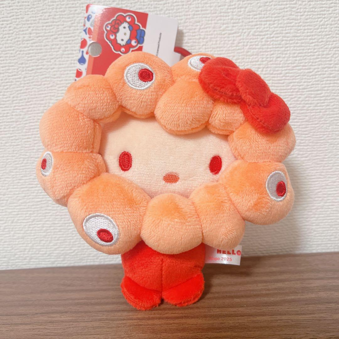 推しカラー サンリオミャクミャク キティBC カラビナ 万博 - メルカリ