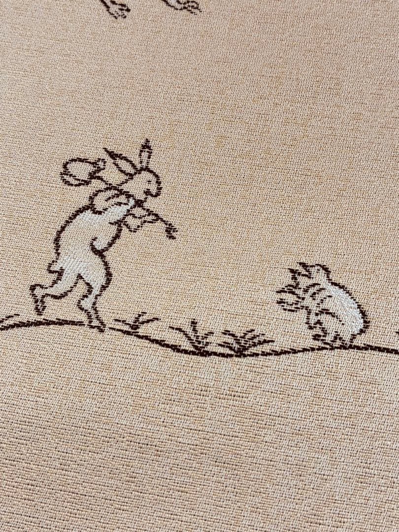 素敵な装い！西陣名古屋帯 綿芯仕立付 「鳥獣人物戯画」クリーム