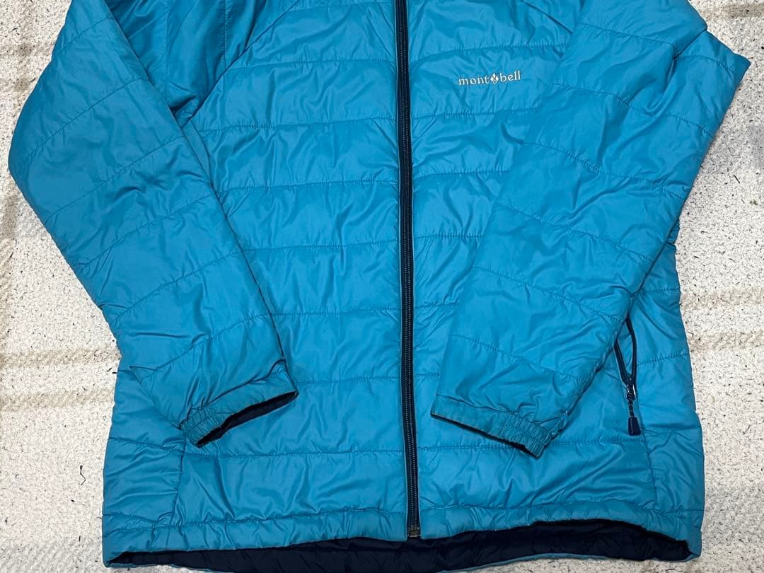 mont-bellダウンジャケット 水色 短丈 リバーシブル おーた着 - メルカリ