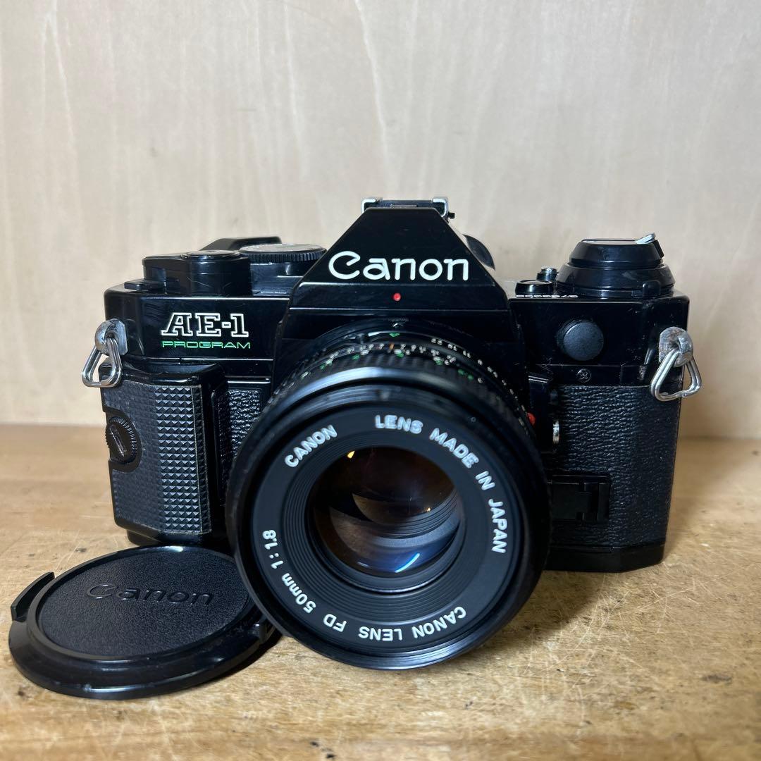 Canon AE-1 P +FD 50 f1.8 鳴きなし完動極美品 Canon AE-1 PROGRAM (Black) + New FD 50mm F1.8 – 東京CAMERA