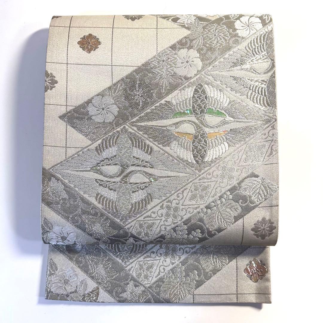 6k264 袋帯 絹 螺鈿 唐織 鶴 銀色 白 花柄 和装 着物 - メルカリ