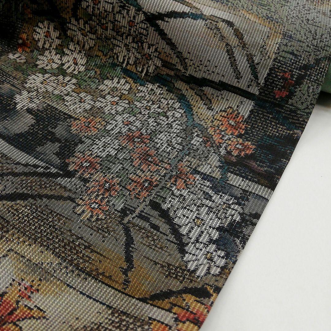 本場大島紬(袷) (四季の草花紋様 恵 積五郎(絣の魔術師) 裄68㌢身幅
