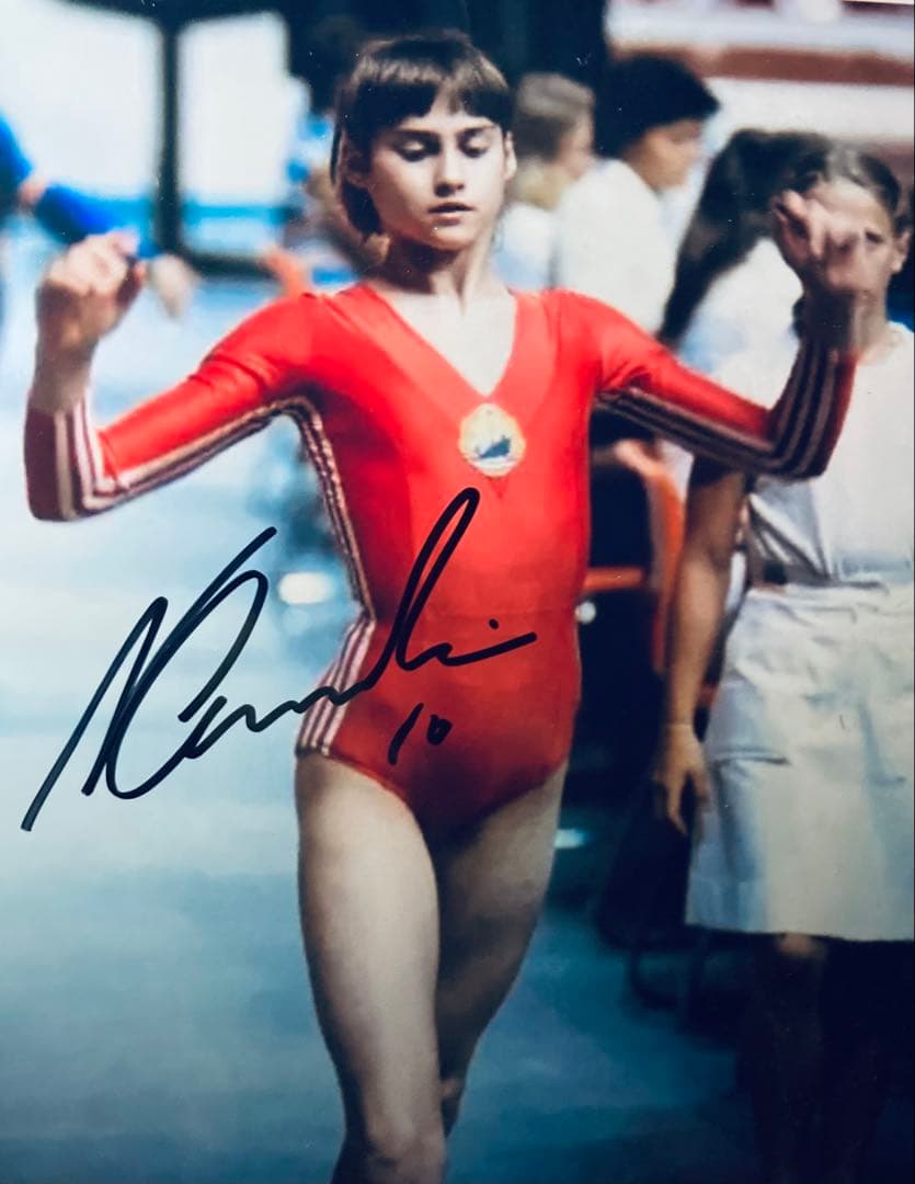 体操選手 ナディア・コマネチ 直筆サイン入り写真 金メダリスト 白い
