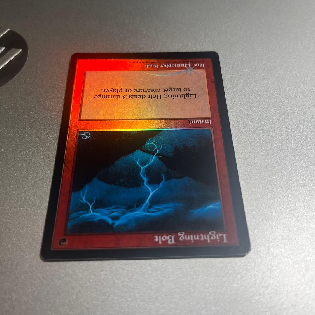 ③ MTG foil 《稲妻/Lightning Bolt》(ジャッジ褒賞)旧枠